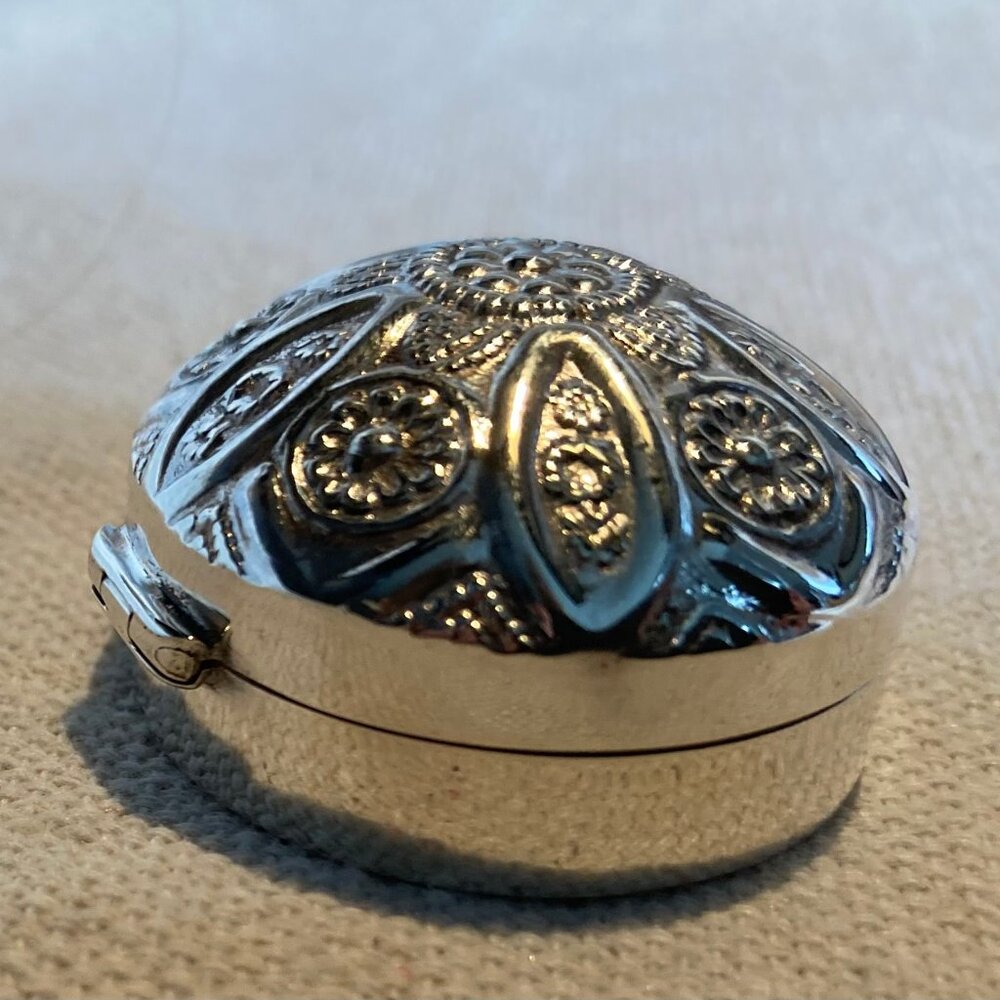 Beautiful round domed repousee  sterling pill box